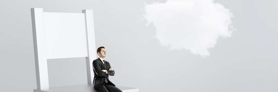 Persons sitting on a chair with a cloud overhead
