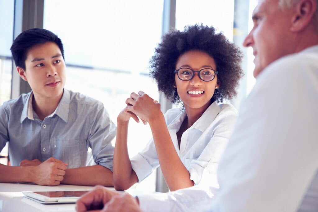 3 IT professionals working together