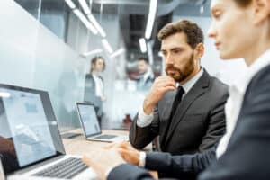 bank employees working on a bank disaster recovery plan