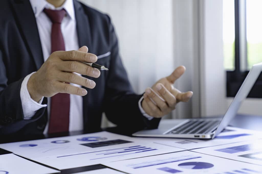 Businessman discussing finance over desk